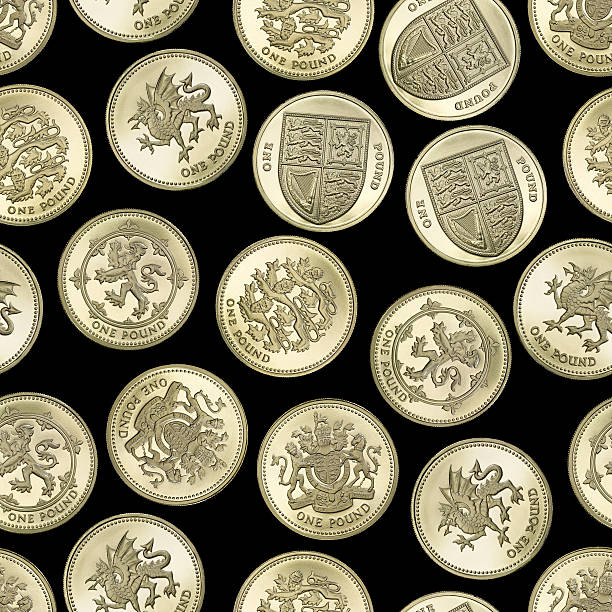 シームレスな質感の 1 ポンドイギリス硬貨に黒色の背景 - dragon one pound coin british currency british pounds ストックフォトと画像