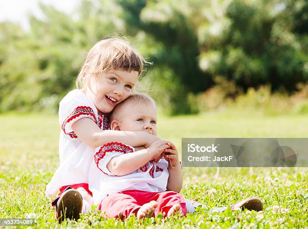 Happy Children In Folk Clothes Stock Photo - Download Image Now - 2-3 Years, Adult, Baby - Human Age