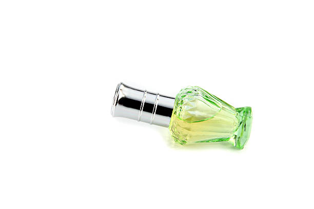istock Green bottle of perfume. 453739039