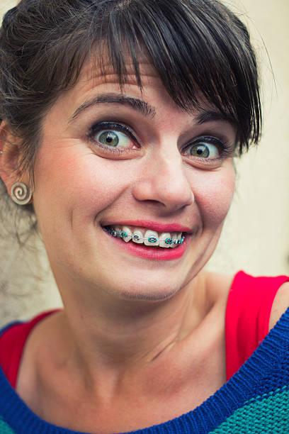 istock Surprised woman wearing braces 453741959
