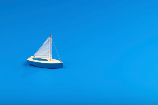 Little blue toy boat
