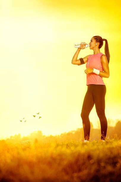 istock thirsty sporty woman 453750223
