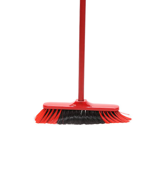 istock Close up of red black broom. 453750565