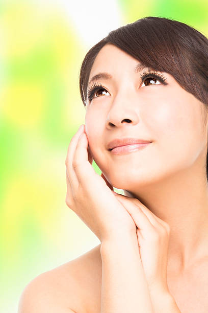 istock close up beautiful young asian Woman face 453755295