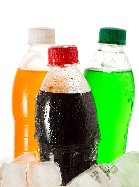 istock cold bottles of soda in ice 453755375