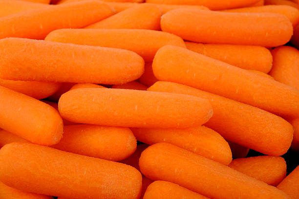 istock baby carrot background 453756415