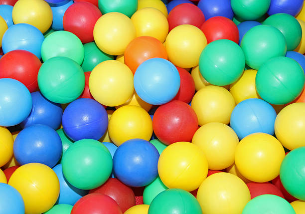 istock plastic beads green red yellow and blue 453760037
