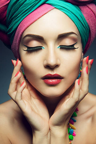 istock Beautiful lady with colored turban 453760405