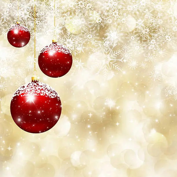 Christmas background of  baubles on falling snowflakes