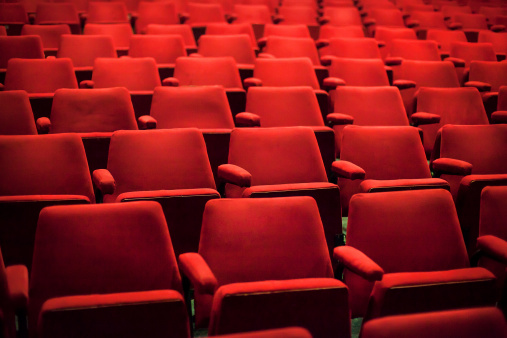 Empty red seats in a theatre or cinema
