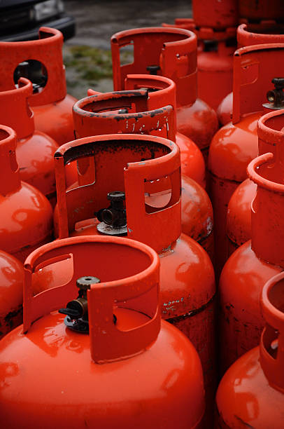 istock Row of red gas canisters 453767509