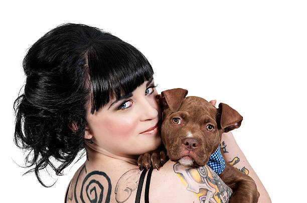 istock Beautiful Woman and Pit Bull Puppy 453770017