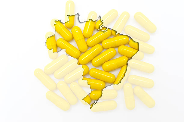 Outline map of brazil with pills in the background stock photo