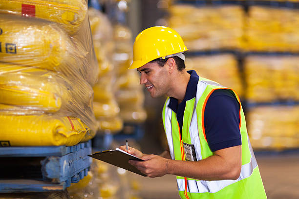 istock young worker recording rice stock 453772485