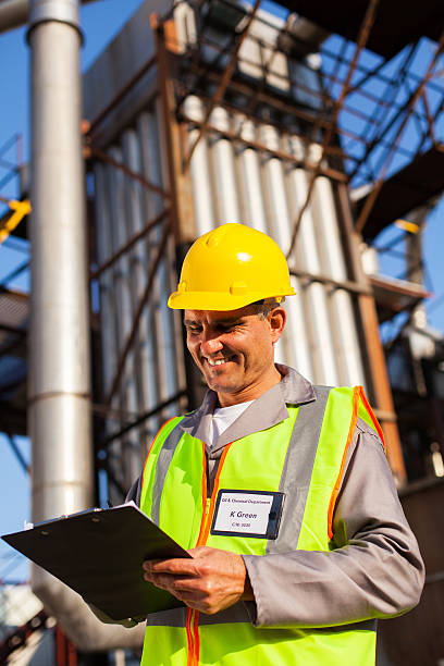 istock middle aged heavy industry worker in plant 453772597