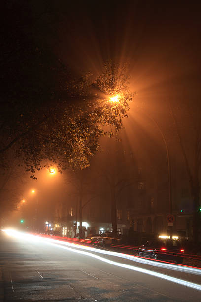 istock Street by night and fog 453780303