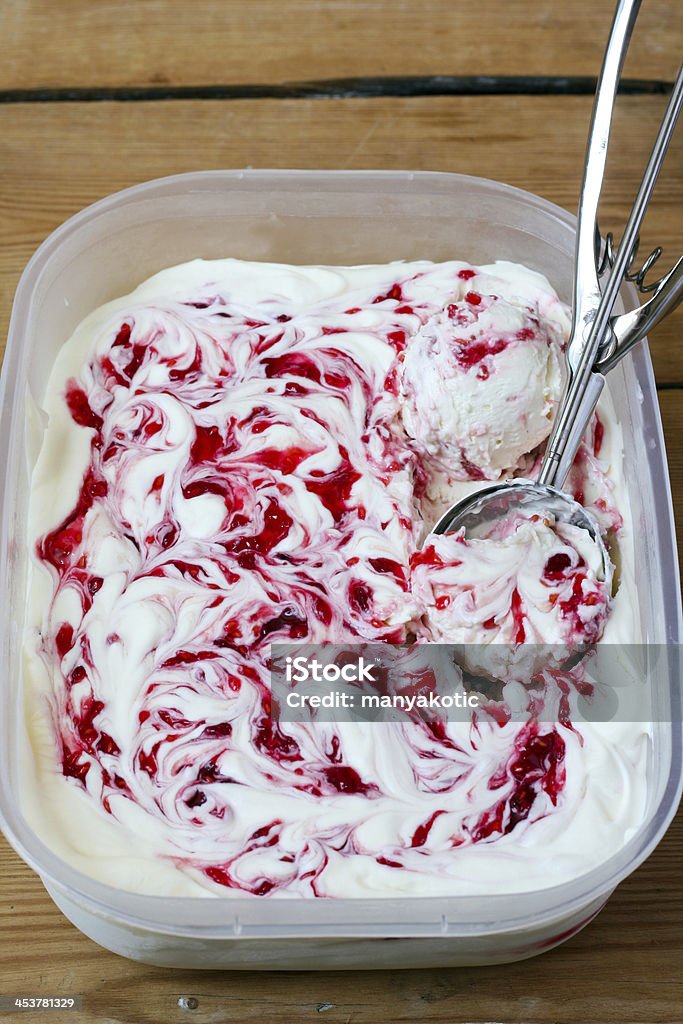 Homemade raspberry ice cream Homemade raspberry ice cream in a box Berry Fruit Stock Photo