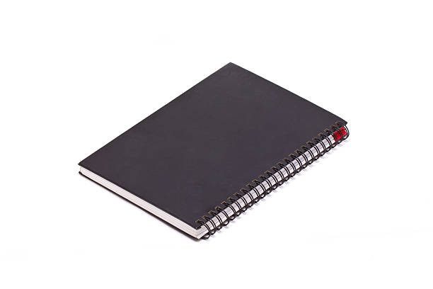 istock Black hard cover notebook with ring binder isolated on white. 453782473