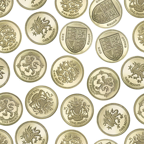 Seamless texture of British One Pound coins on white background One pound coins, extremely sharp and create a nice pattern. three lions england stock pictures, royalty-free photos & images