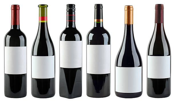 White labels on various shaped wine bottles stock photo