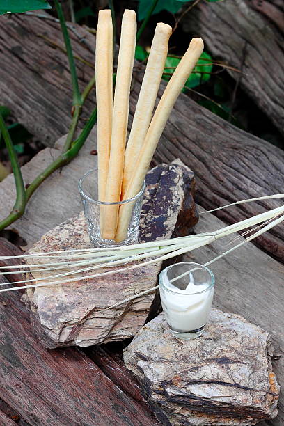 istock Snack time by Italian Breadsticks with cream sauce 453800385