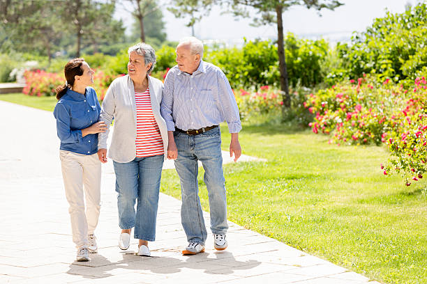 istock Senior couple with caregiver 453803639