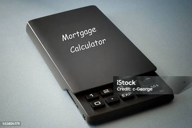 Foto de Calculadora De Hipoteca e mais fotos de stock de Analisar - Analisar, Calculadora, Calcular