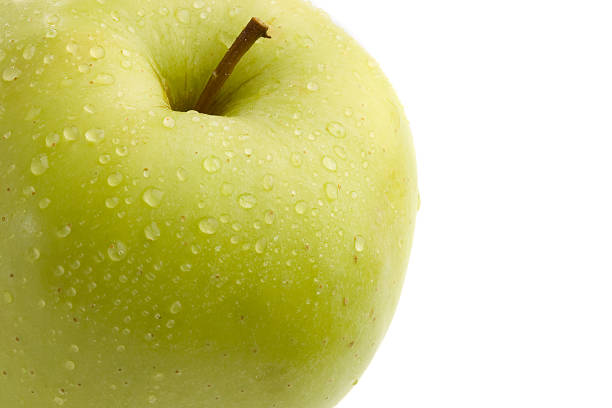 istock Green delicious apple with drops of water 453804661