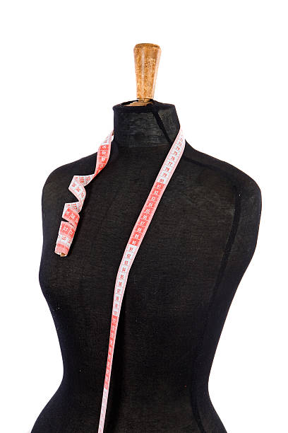 istock Mannequin with a tape measure 453805571
