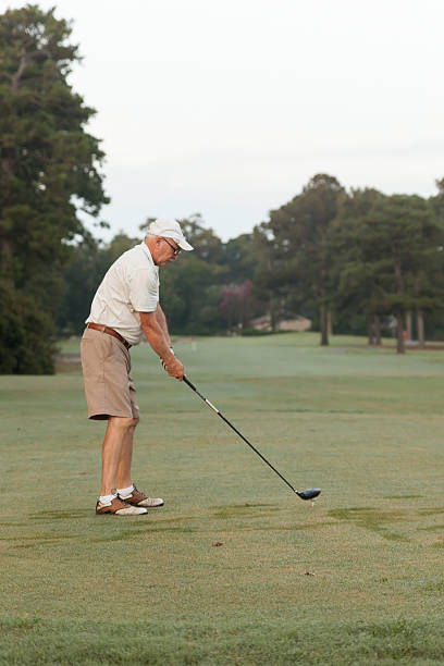 istock Senior Male Prepares to Tee Off 453805991