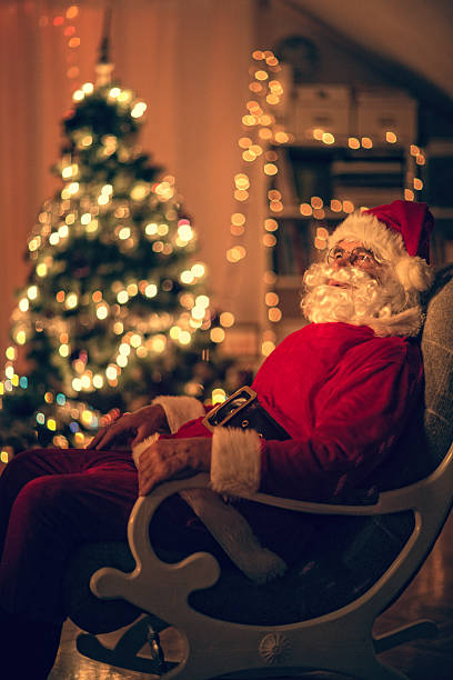 istock Santa Claus relaxing at home 453820353