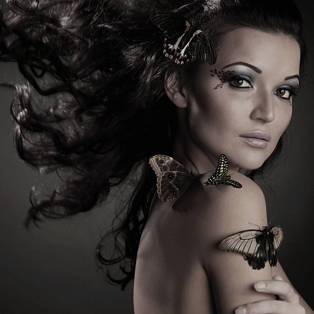 istock woman and butterfly 453836777