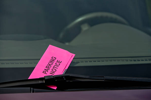 istock Parking Ticket Notice on Car Windshield Close Up Horizontal 453839833