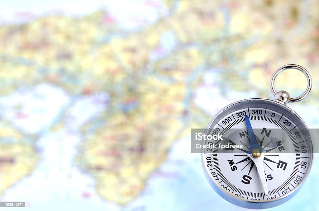 Silver Compass On Map Silver Compass And Map Stock Photo - Download Image Now - Arrow Symbol ...