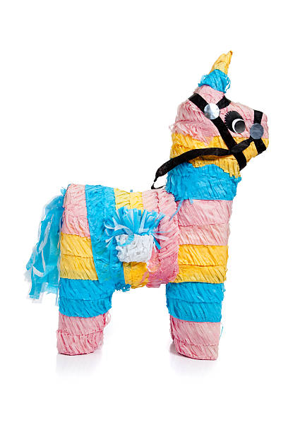 istock Pink, blue and yellow burro pinata on white 453841899