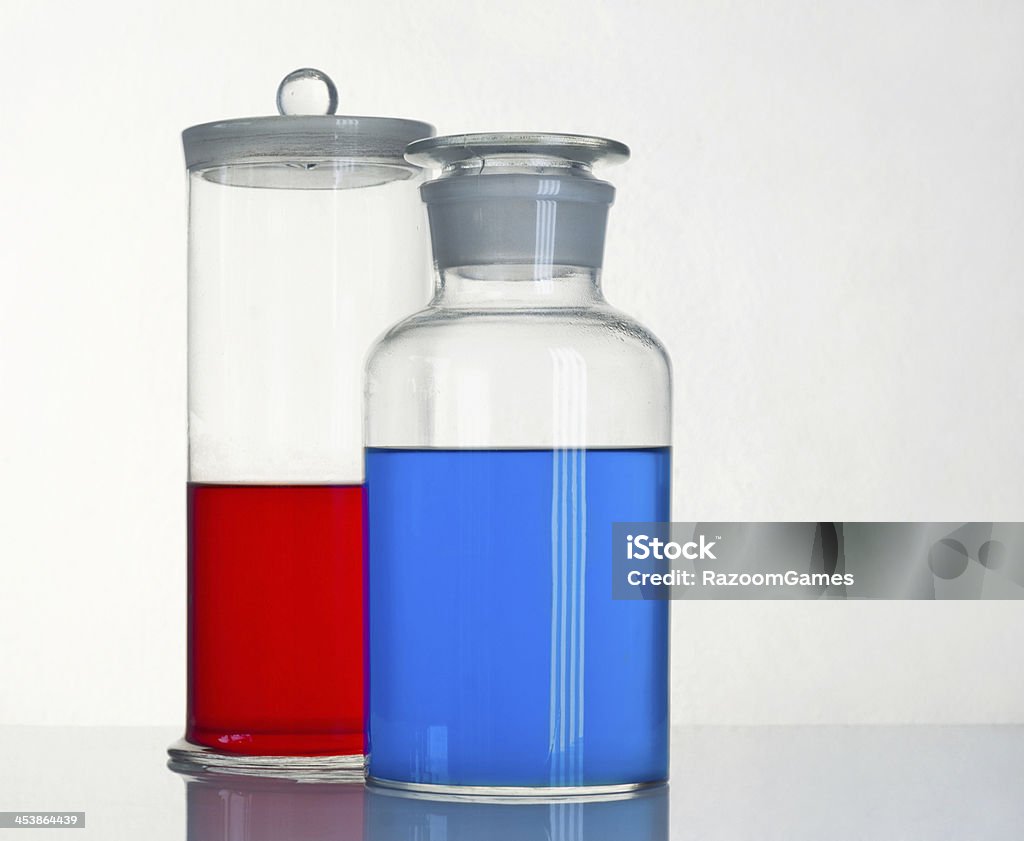 Beakers Two beakers with a reagents are on the table Abstract Stock Photo