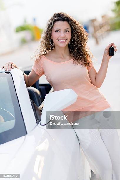 Woman Holding Keys Of Her Car Stock Photo - Download Image Now - Car, Car Dealership, Adult