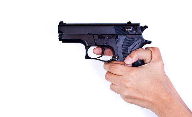 istock Gun In Woman Hand 453877757