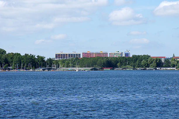istock High-rise buildings by the lake 453885431