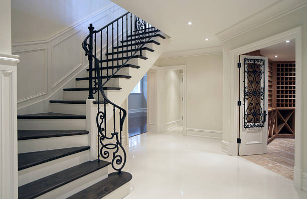 New Mansion Hallway Hallway Interior of brand new mansion residence in North America. house railing stock pictures, royalty-free photos & images