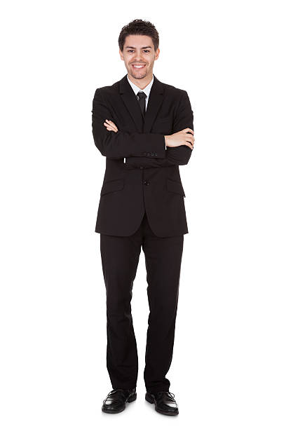 istock Businessman standing with folded arms 453893031