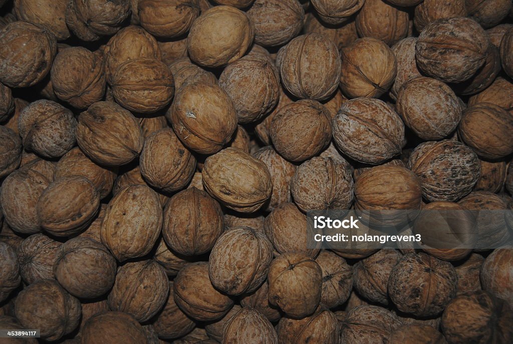 Walnuts Lots of walnuts together Backgrounds Stock Photo