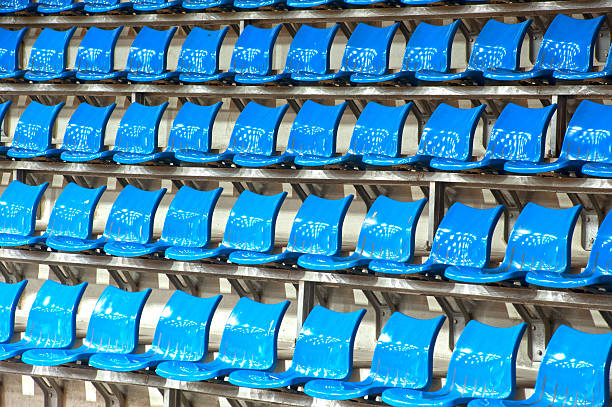 istock Plenty of  blue plastic seats at stadium . 453896437