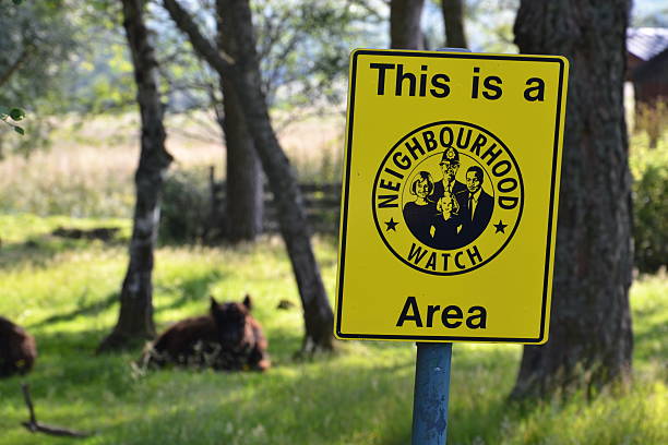 Big Brother Neighborhood watch sign in cow paddock, Scotland neighborhood crime watch stock pictures, royalty-free photos & images