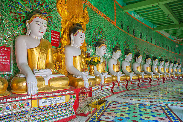 istock Buddhas and wall in temple, Sagaing hill, Mandalay, Myanmar 453911795