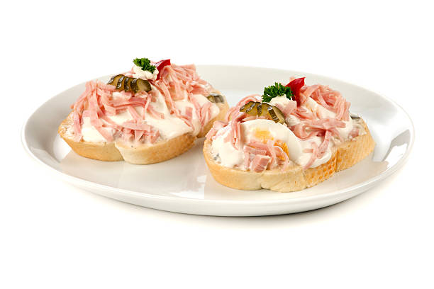 open sandwiches with ham, eggs and potato salad - skink och potatissallad bildbanksfoton och bilder