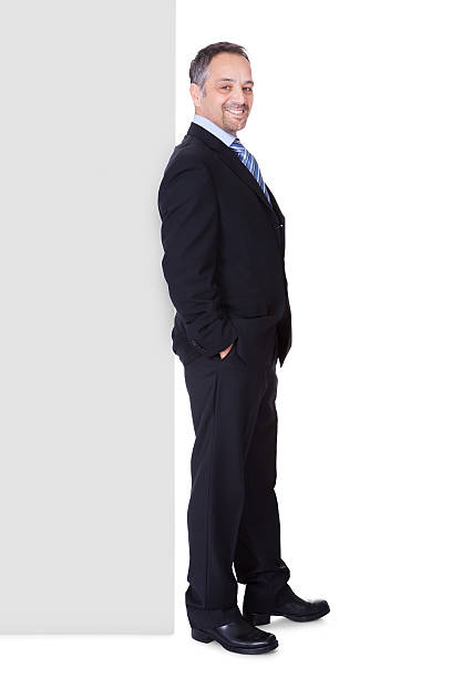 istock Happy Businessman Holding Blank Billboard 453919861