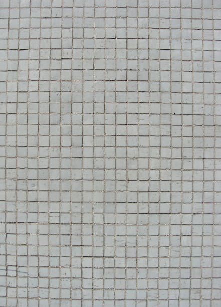 istock small white mosaic tiles on a wall 453926047
