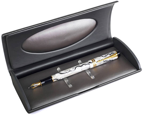 istock Pen in a gift box isolated on white 453933847
