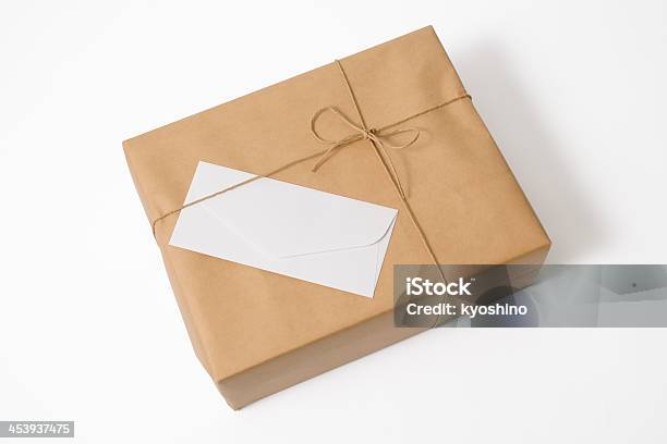 ブラウンの高角度のビューくるまるパッケージブランクの封筒を開ける - クローズアップのストックフォトや画像を多数ご用意 - クローズアップ, 包まれた, 包装紙